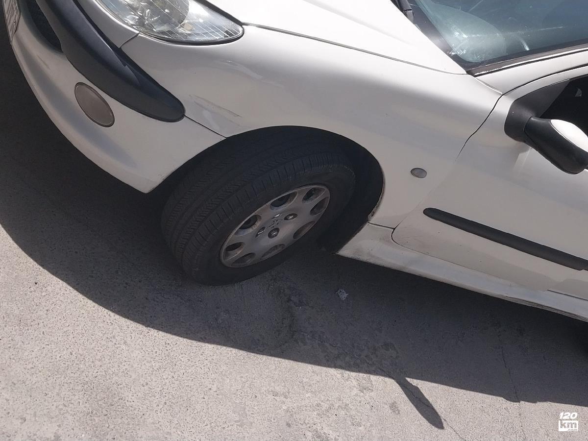 فروش پژو 206 تیپ 2 ۱۳۸۸ سفید دور رنگ کرج مهرشهر (۶ آبان ۱۴۰۴)