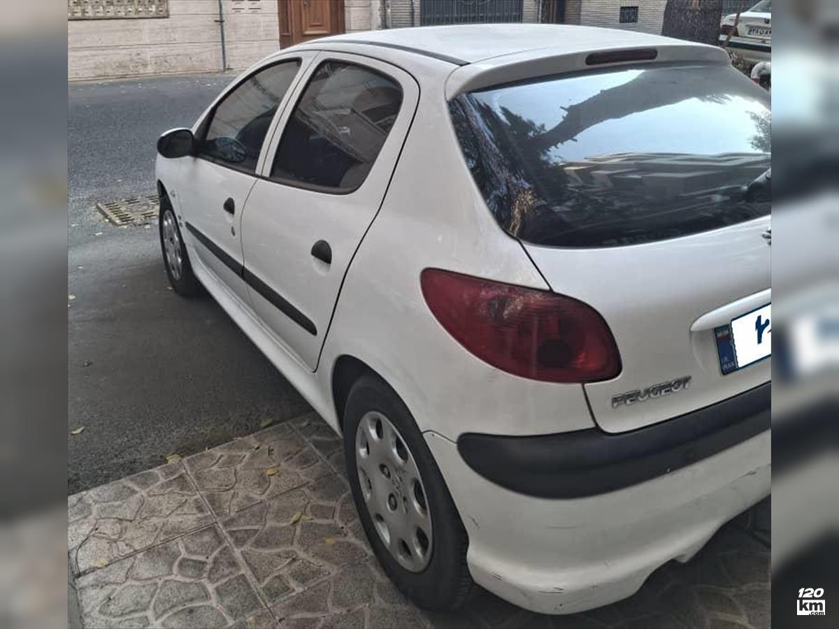 فروش پژو 206 تیپ 5 ۱۳۹۶ (کم کارکرد) سفید کاپوت تعویض تهران نیاوران (۱۱ آبان ۱۴۰۴)