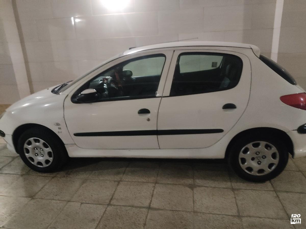 فروش پژو 206 تیپ 2 ۱۳۸۹ (کم کارکرد) سفید بدون رنگ تهران ملارد (۲۲ بهمن ۱۴۰۴)